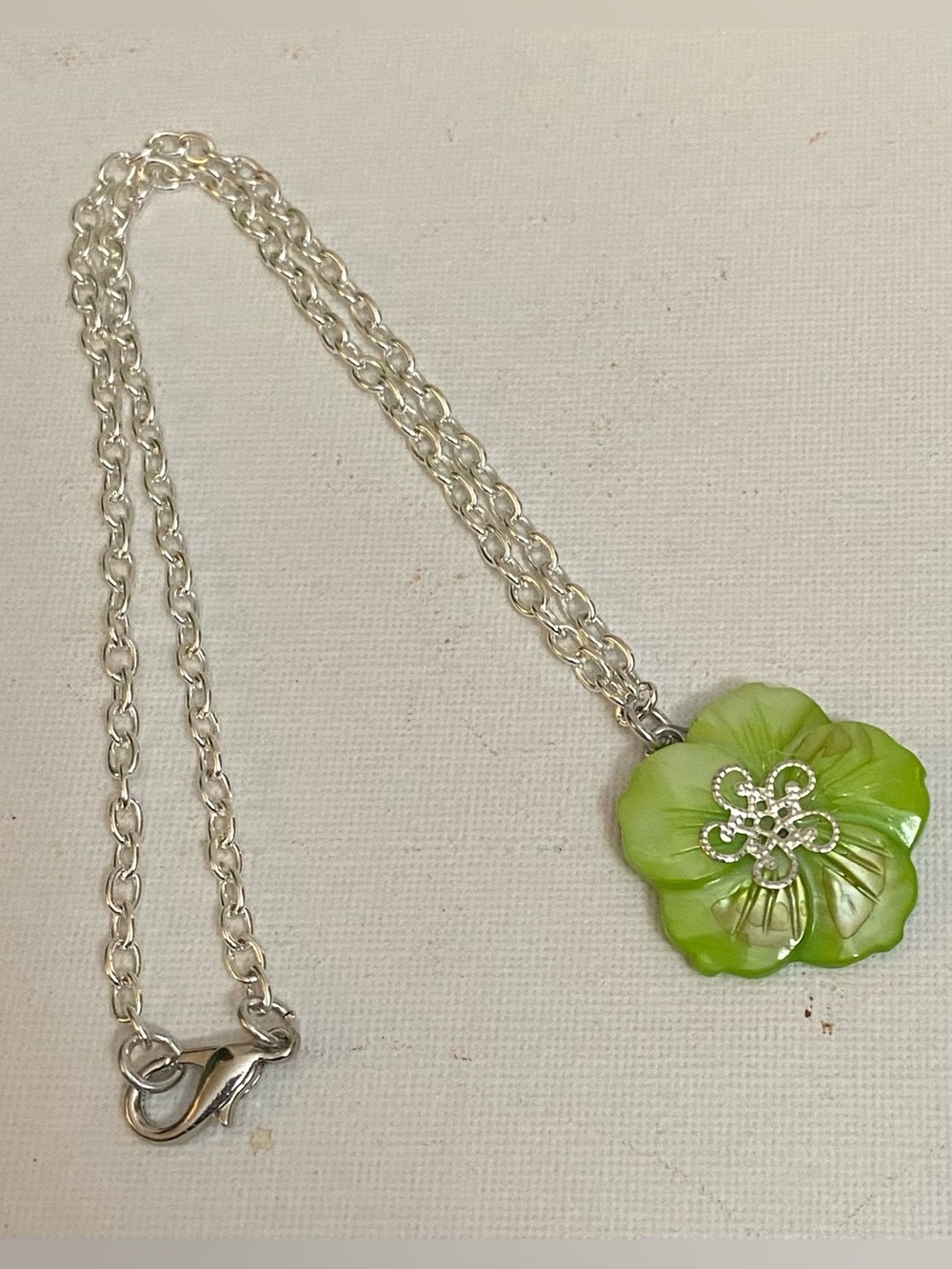 Green carved Mother of Pearl pendant